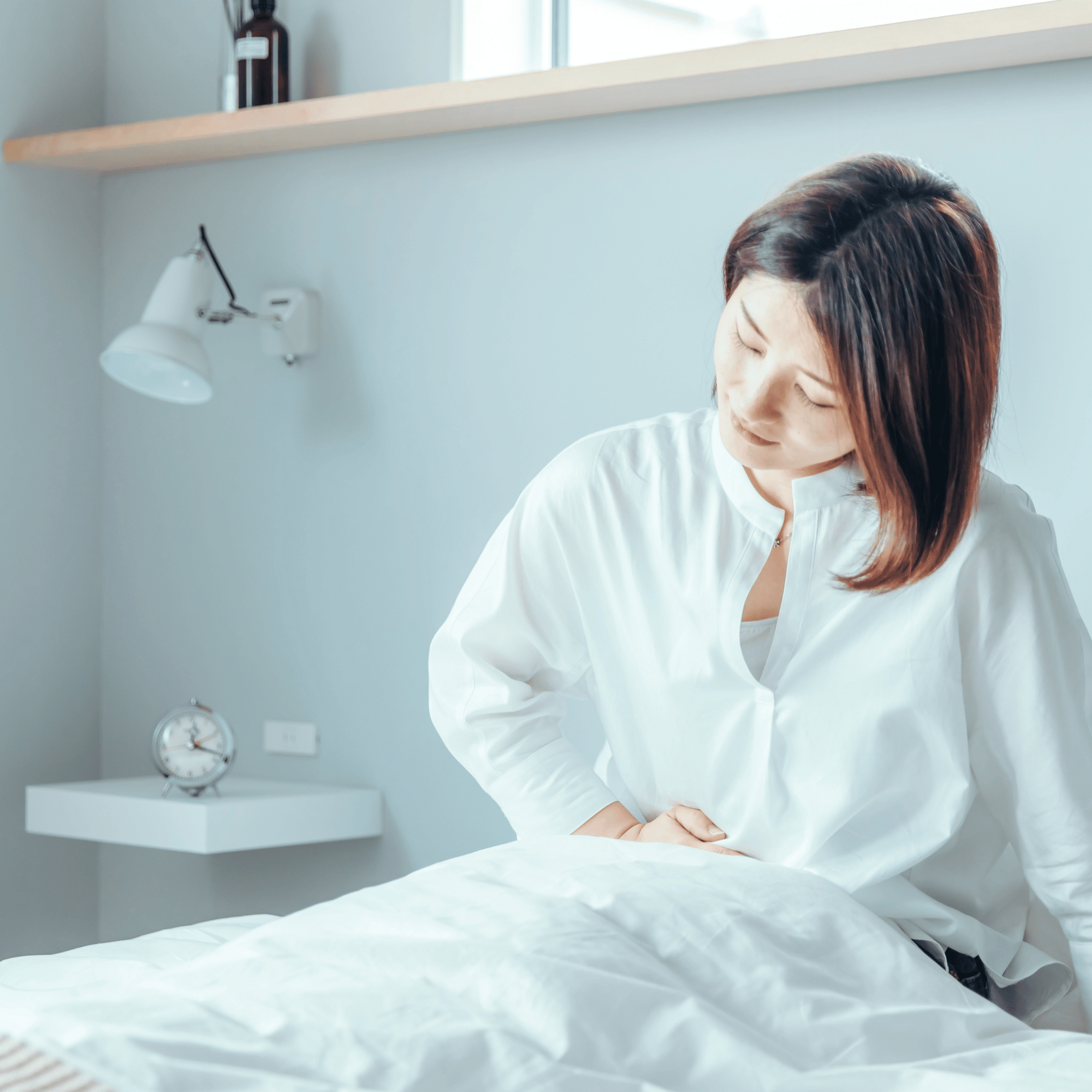 woman suffering from abdominal pain