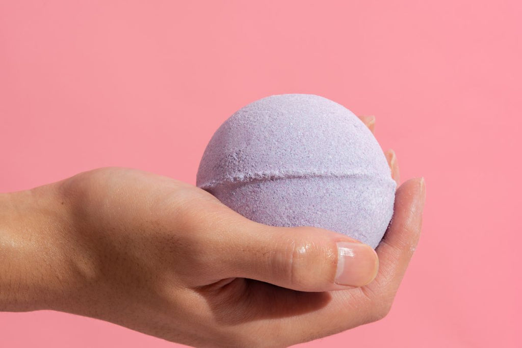 Bath bomb in hand